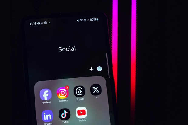 social media icons on the phone screen